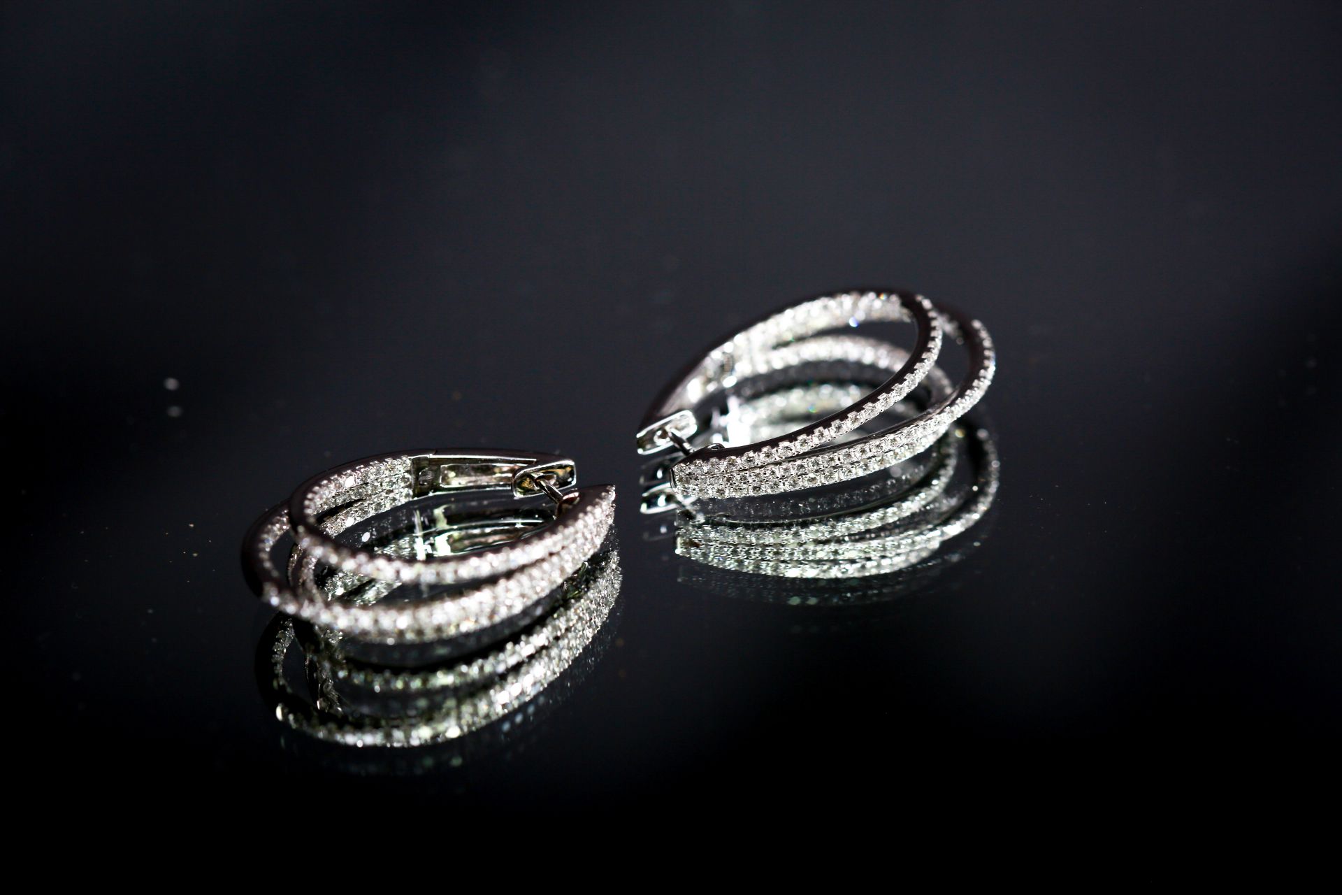 Beautiful bespoke triple horseshoe shaped earrings, featuring 2.20cts of brilliant-cut diamonds