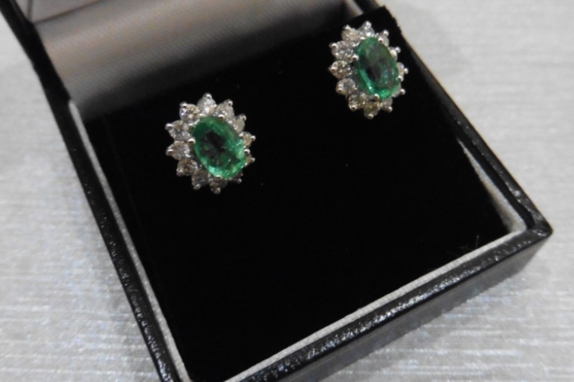 1.60CT EMERALD AND DIAMOND CLUSTER STYLE STUD EARRINGS. - Image 2 of 3