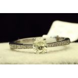 18k White Gold Single Stone Prong Set With Stone Set Shoulders Diamond Ring 0.62