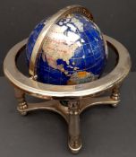 Vintage Brass and Agate Decorative Globe on a Blue Ground. Measures 9 inches diameter. Part of a