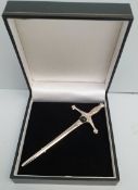 Vintage Retro Silver Coloured Metal Kilt Pin Shaped as a Sword Boxed. Measures 4 inches long. Part