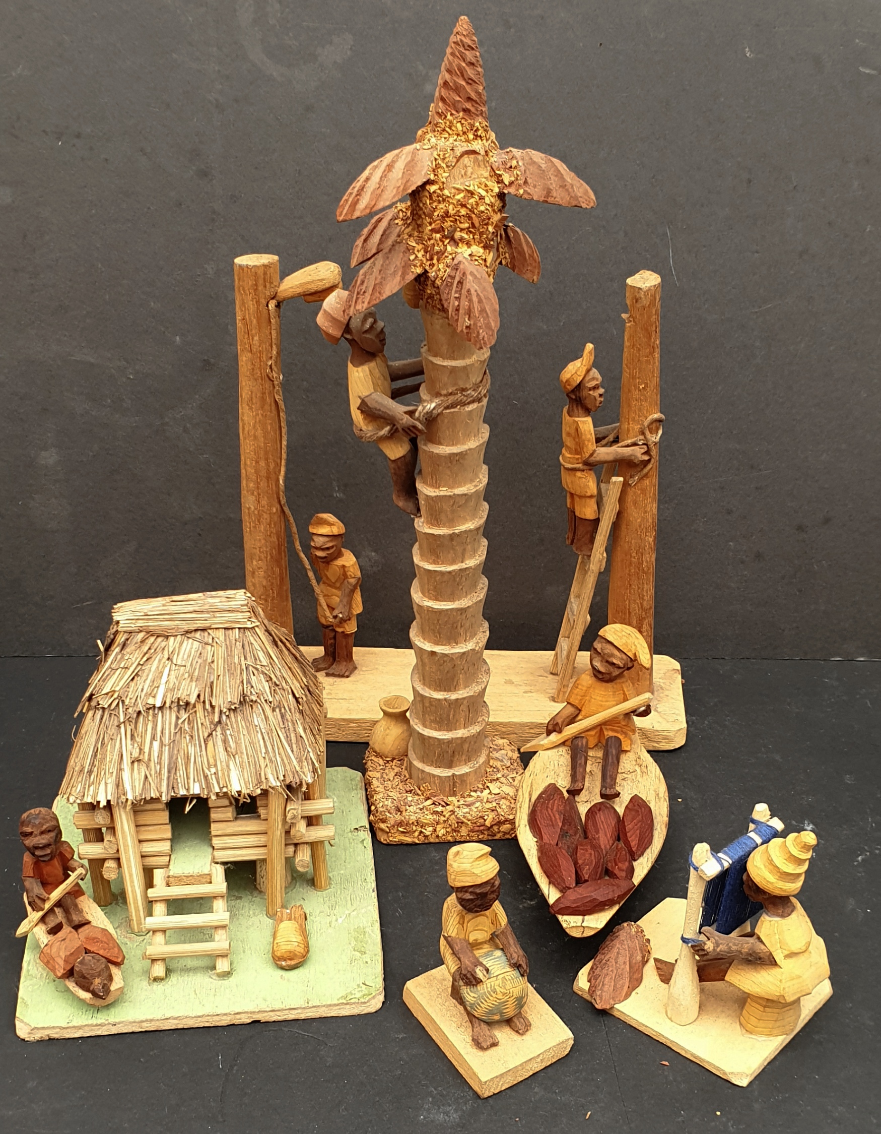 Vintage Retro Kitsch 6 x Hand Carved Wood East African Figures and Village Scene. The tallest