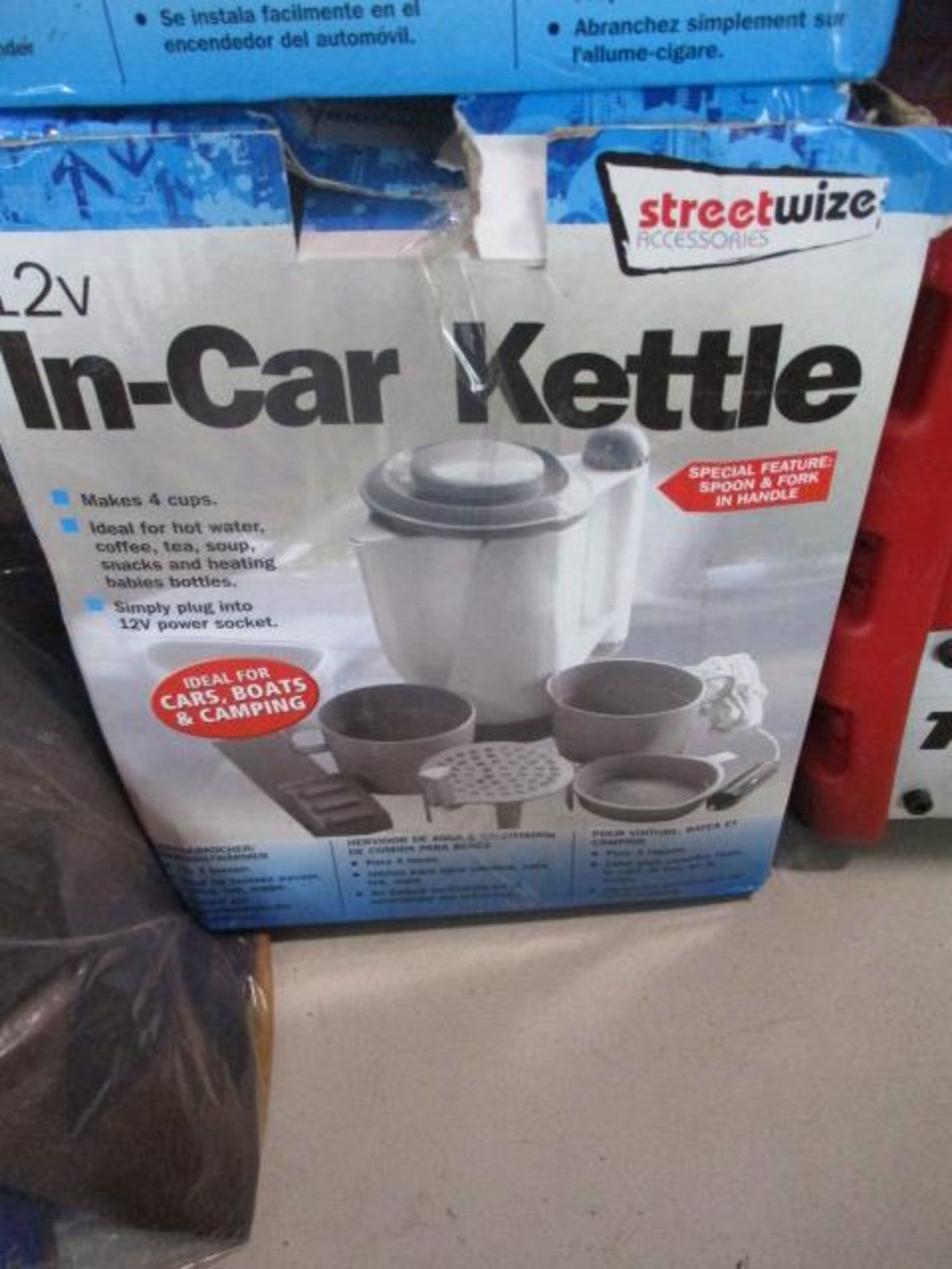 In car kettle. Boxed and in original packaging