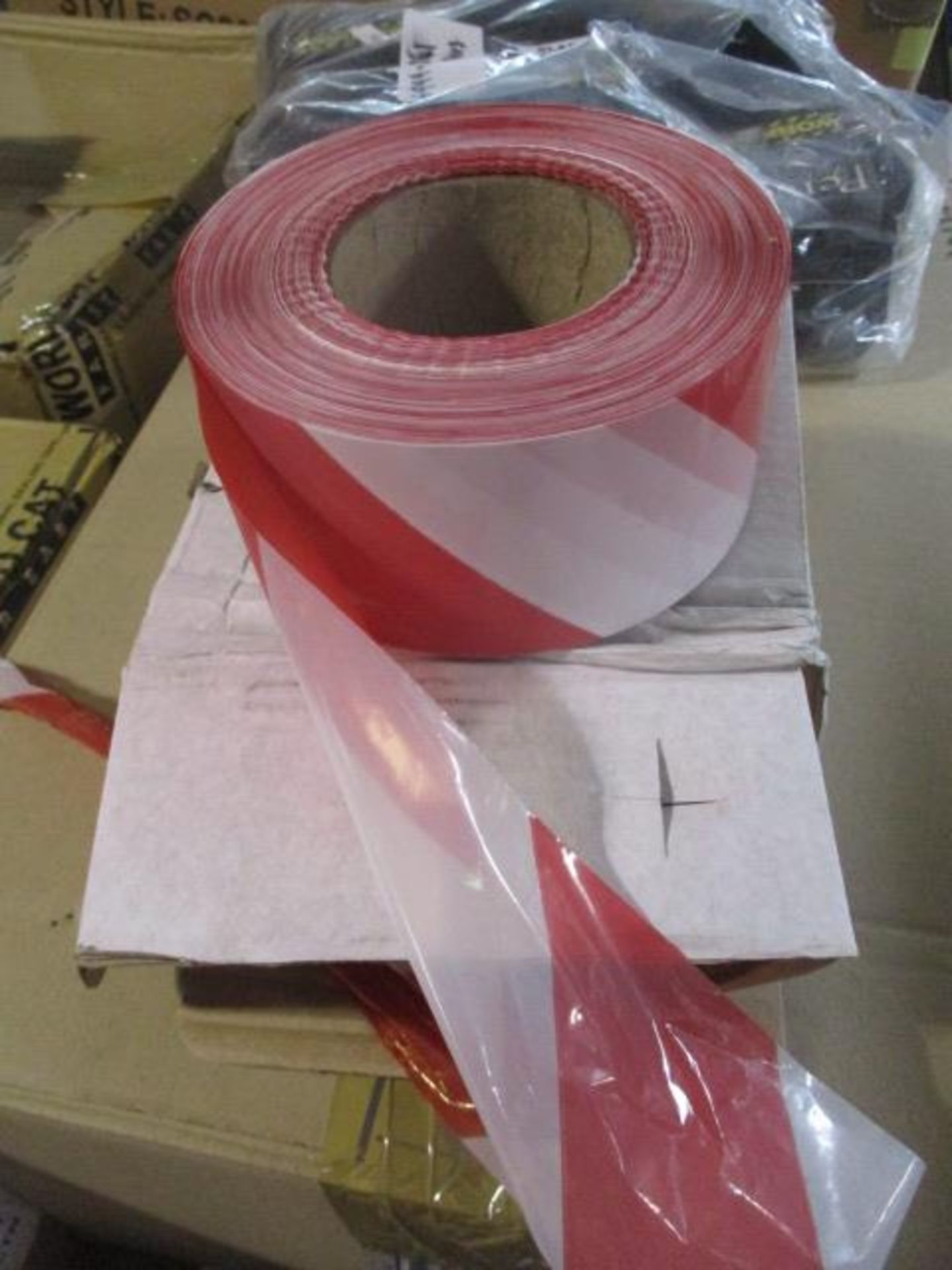 50 boxes of red/white bunting strip on the roll