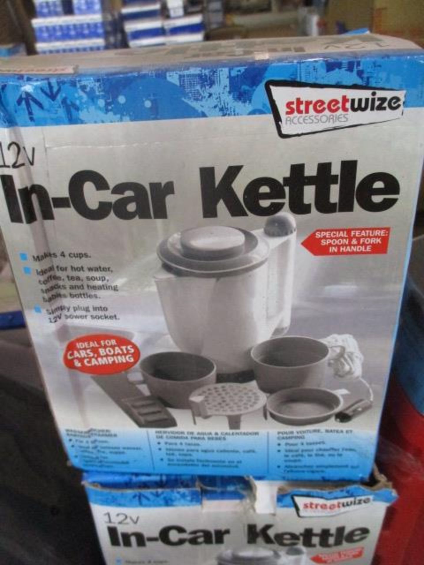 In car kettle. Boxed and in original packaging