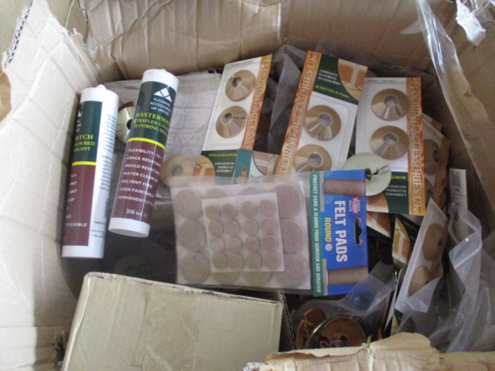 Assorted items to include sealant and other wooden floor fixing items