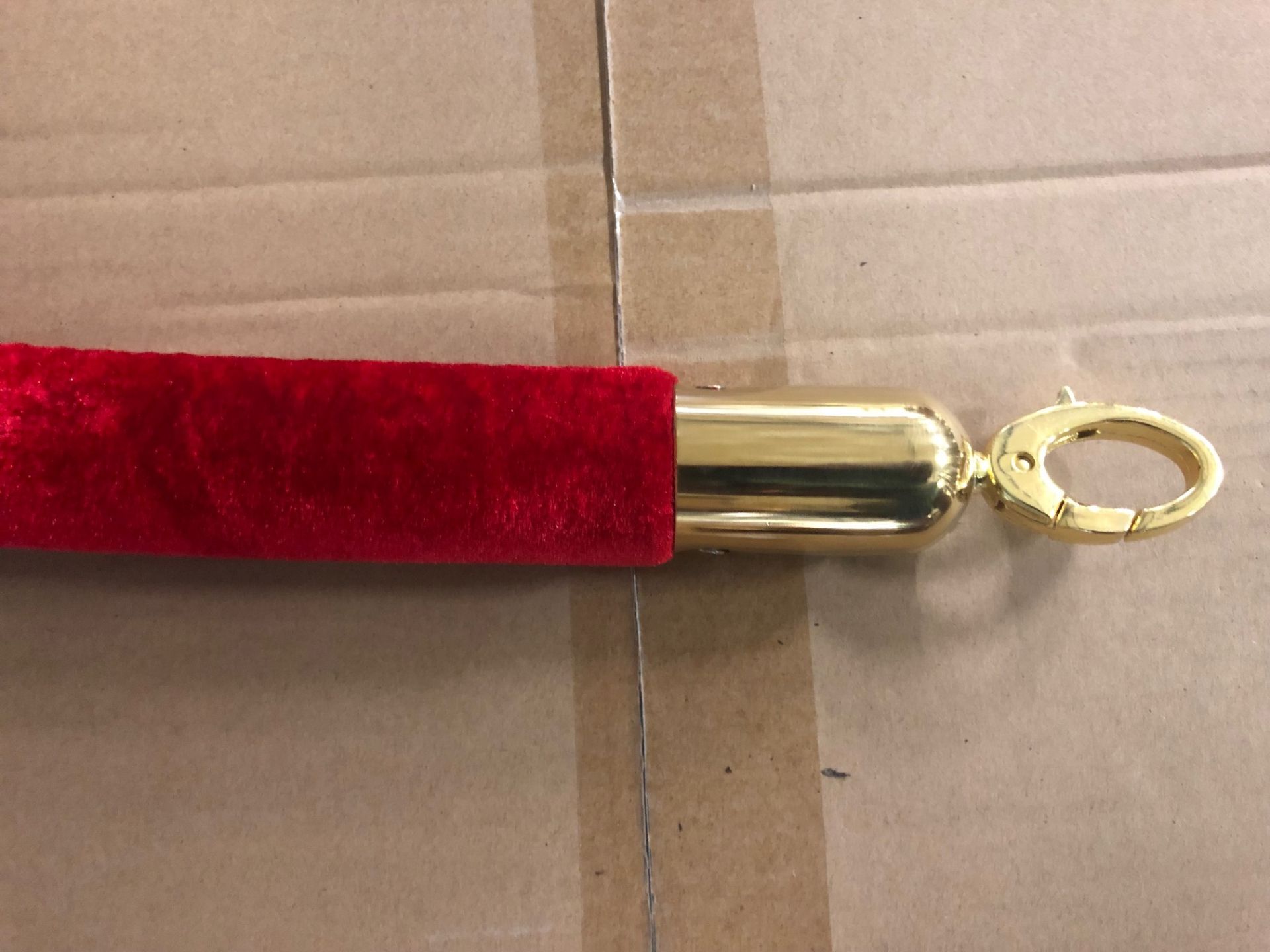 24 x red barrier ropes with gold ends