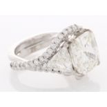 18ct White Gold Three Stone With Halo Setting Ring 4.51 Carats