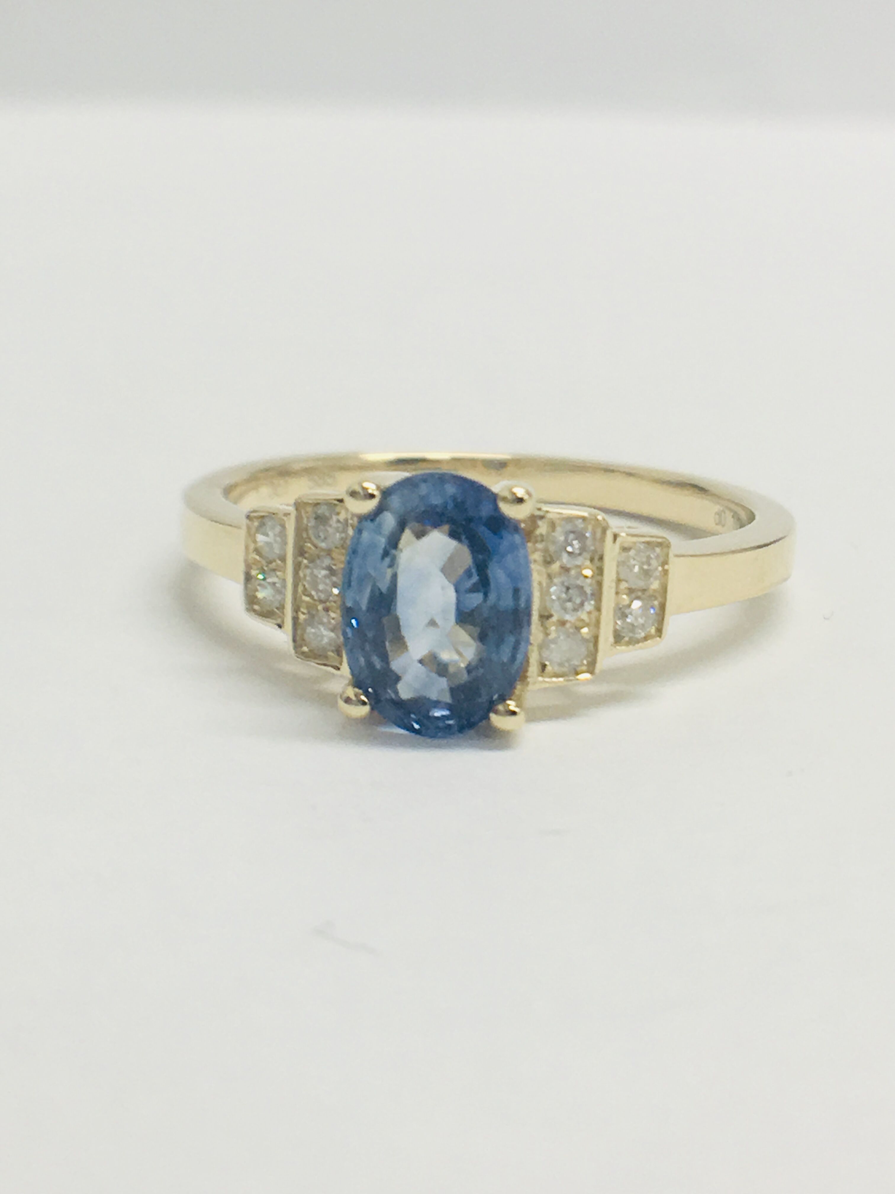 14Ct Yellow Gold Sapphire And Diamond Ring.