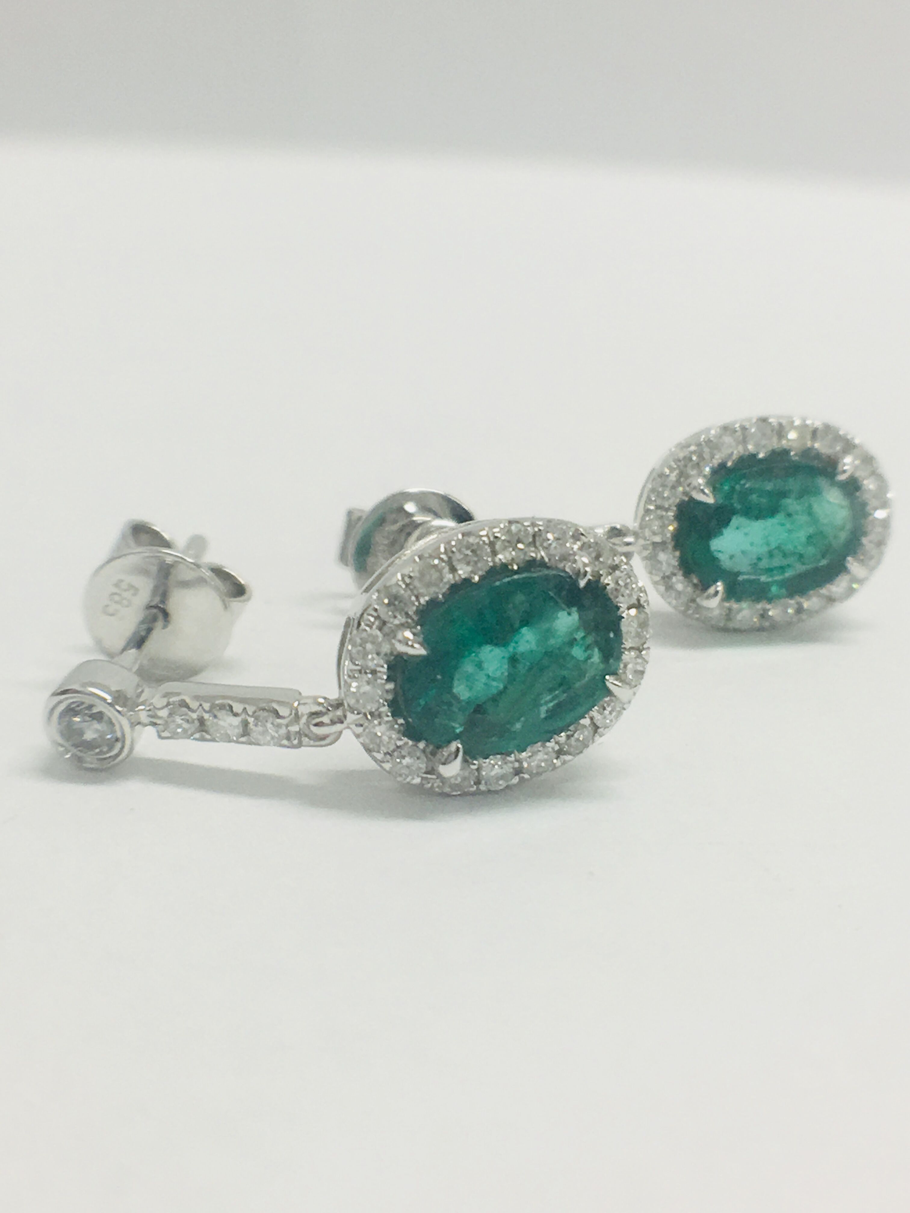 1 Pair 14Ct White Gold Emerald & Diamond Earrings.