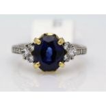 18ct White Gold Three Stone Claw Set Diamond And Sapphire Ring 4.85