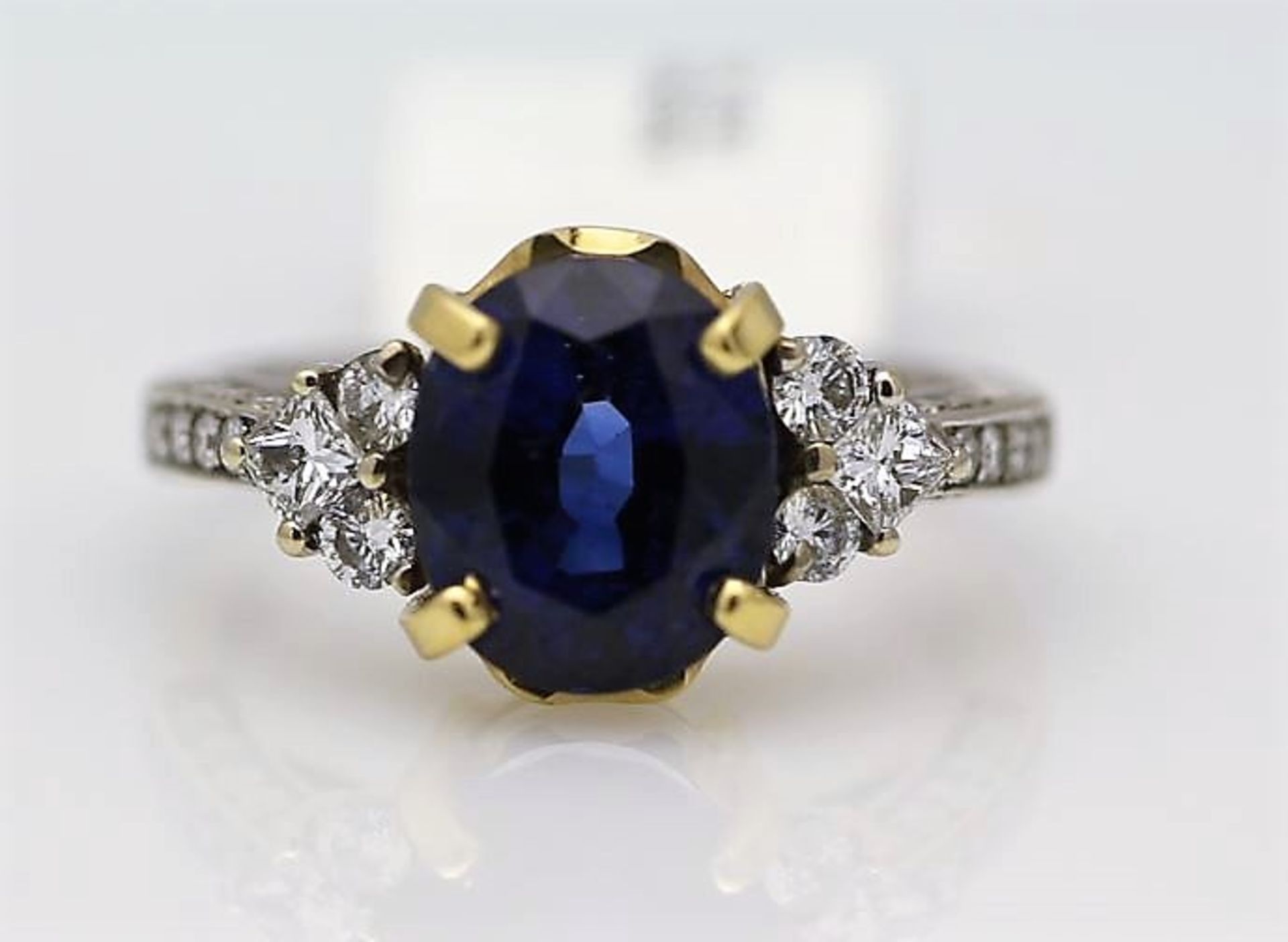 18ct White Gold Three Stone Claw Set Diamond And Sapphire Ring 4.85