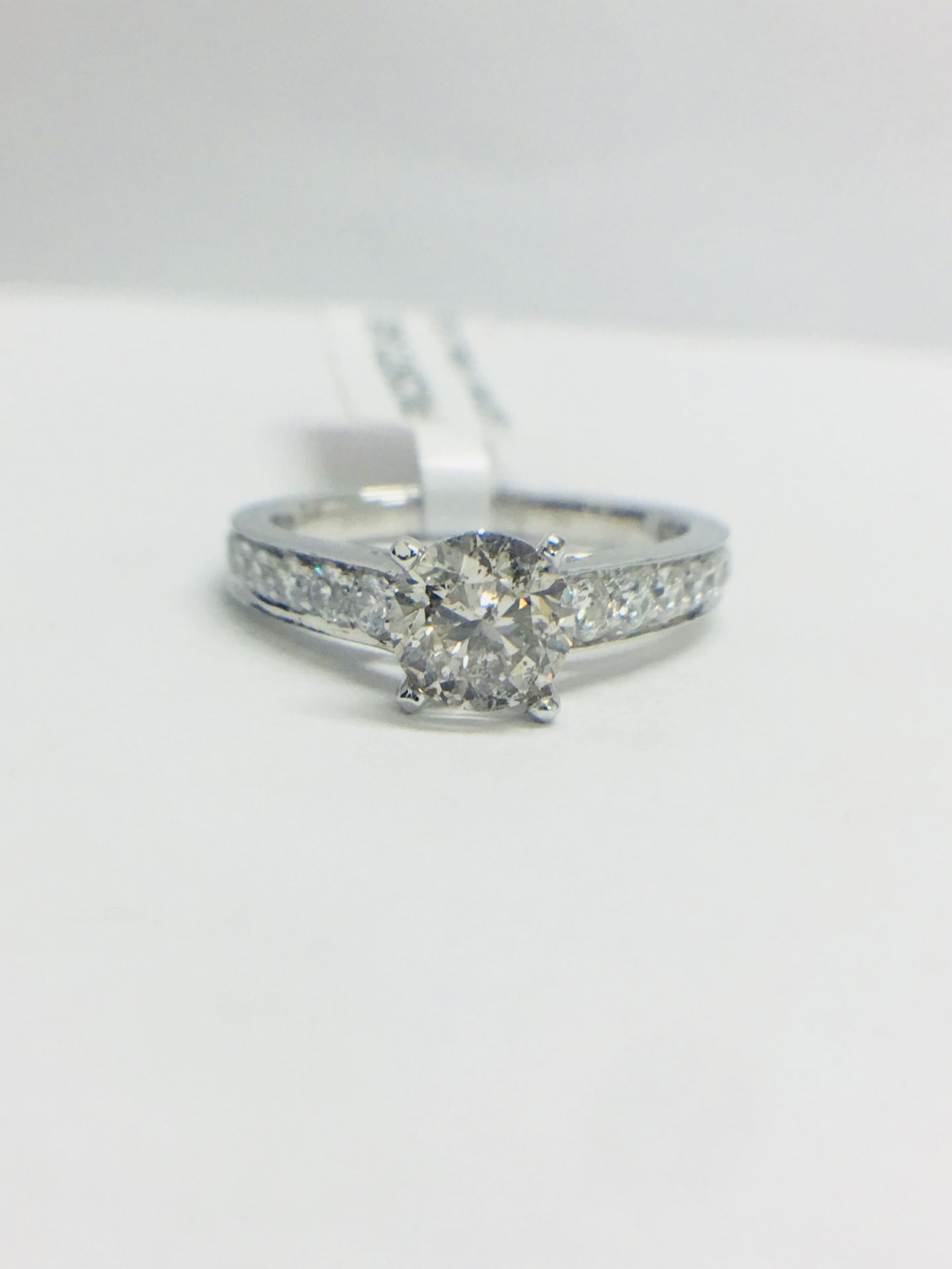 Platinum Diamond Solitaire Ring With Diamond Set Shoulder,