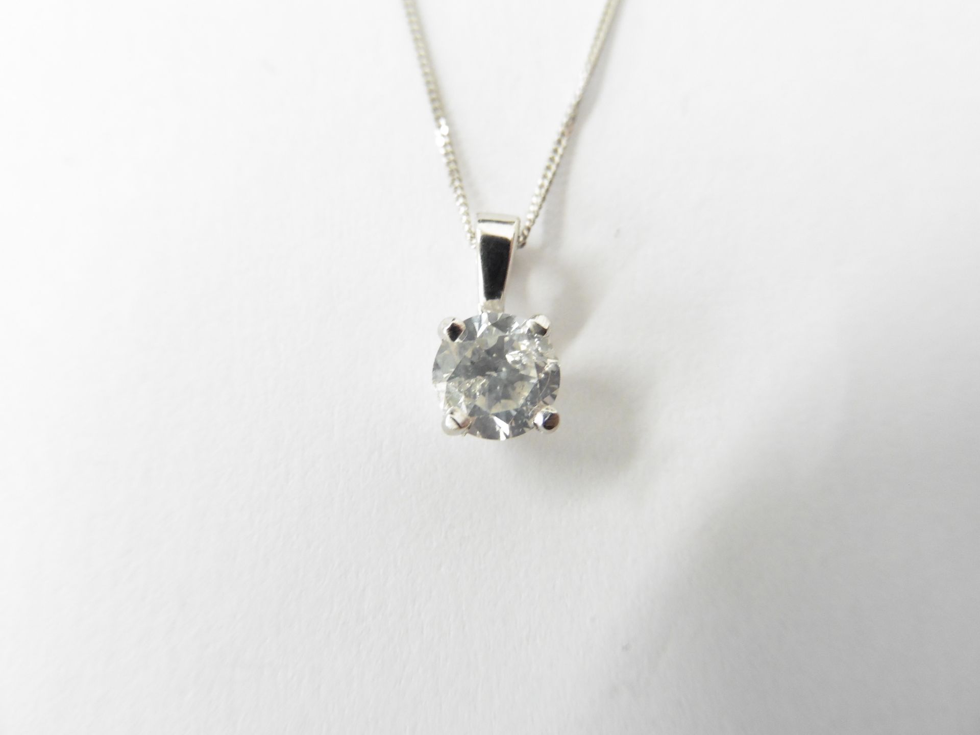 0.50Ct Diamond Solitaire Pendant Set In A Platinum 4 Claw Setting.