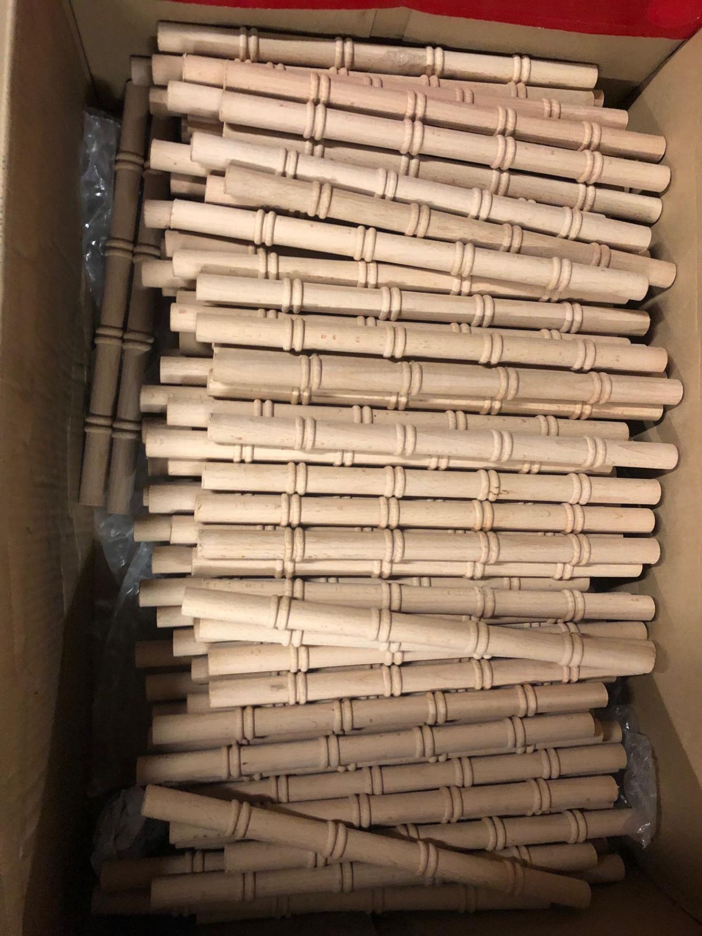 box of replacement chivari chair spindles