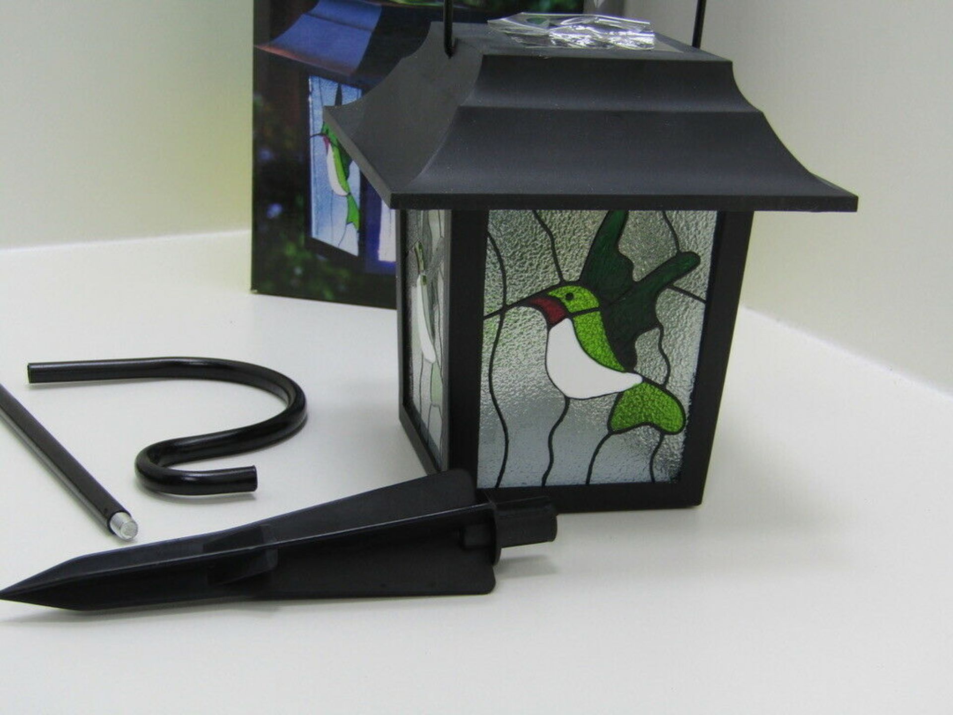 Solar powered humming bird stained glass lantern. LED. Garden Light