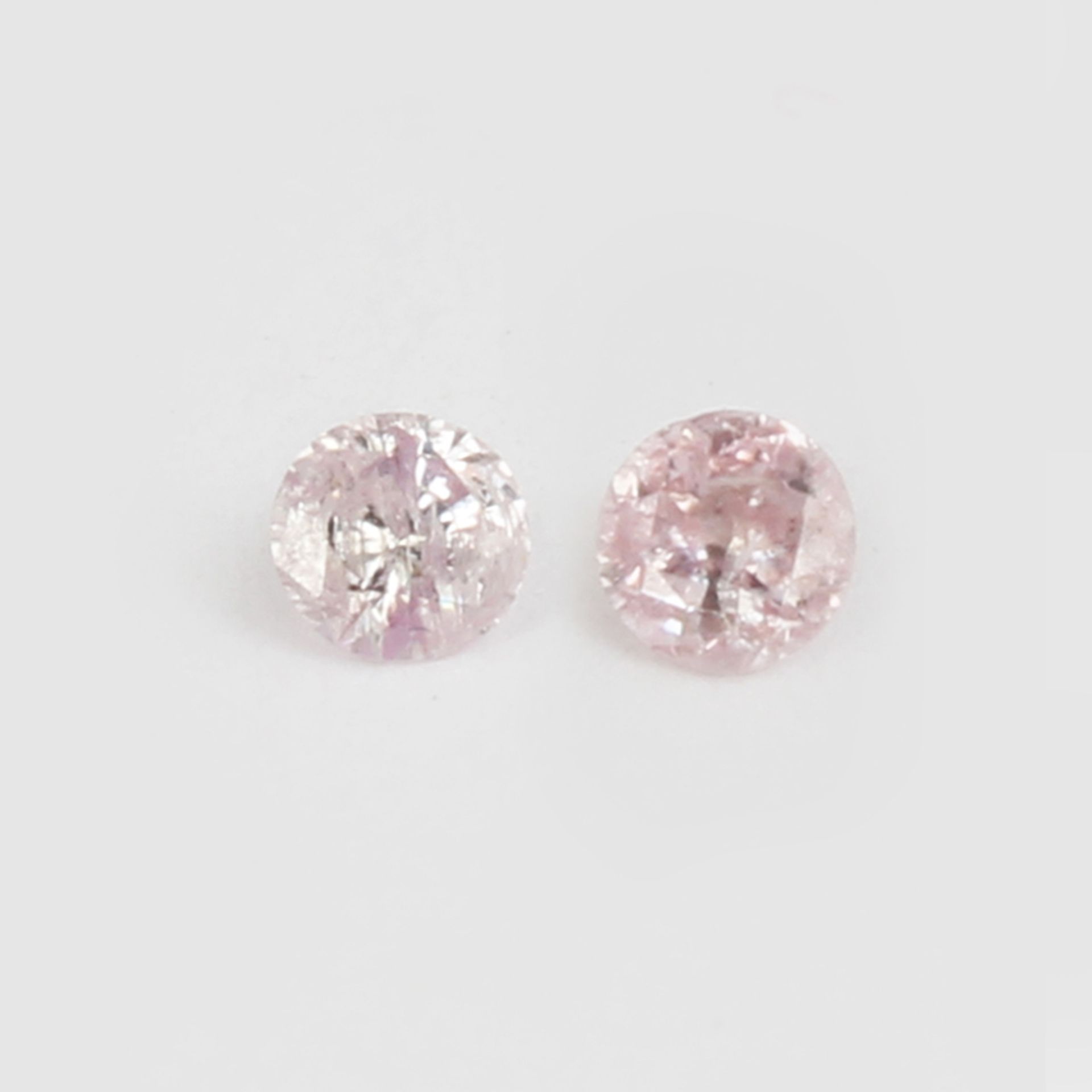 IGI Certified Pair Fancy Light Pink Diamonds Untreated