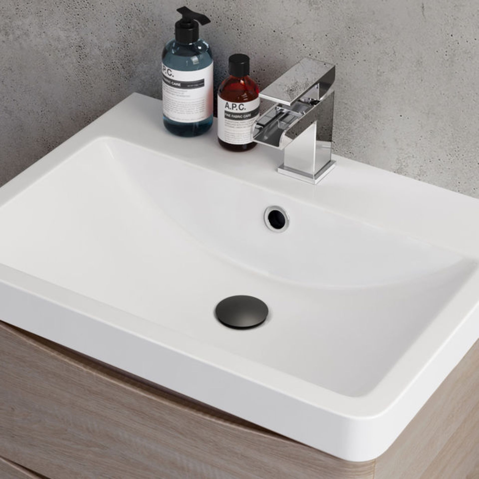 (D1038) Black Slotted Push Button Pop-Up Basin Waste Made with zinc with solid brass component...