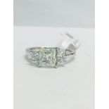 1ct PRincess cut diamond Trilogy ring in a platinum diamond set mount