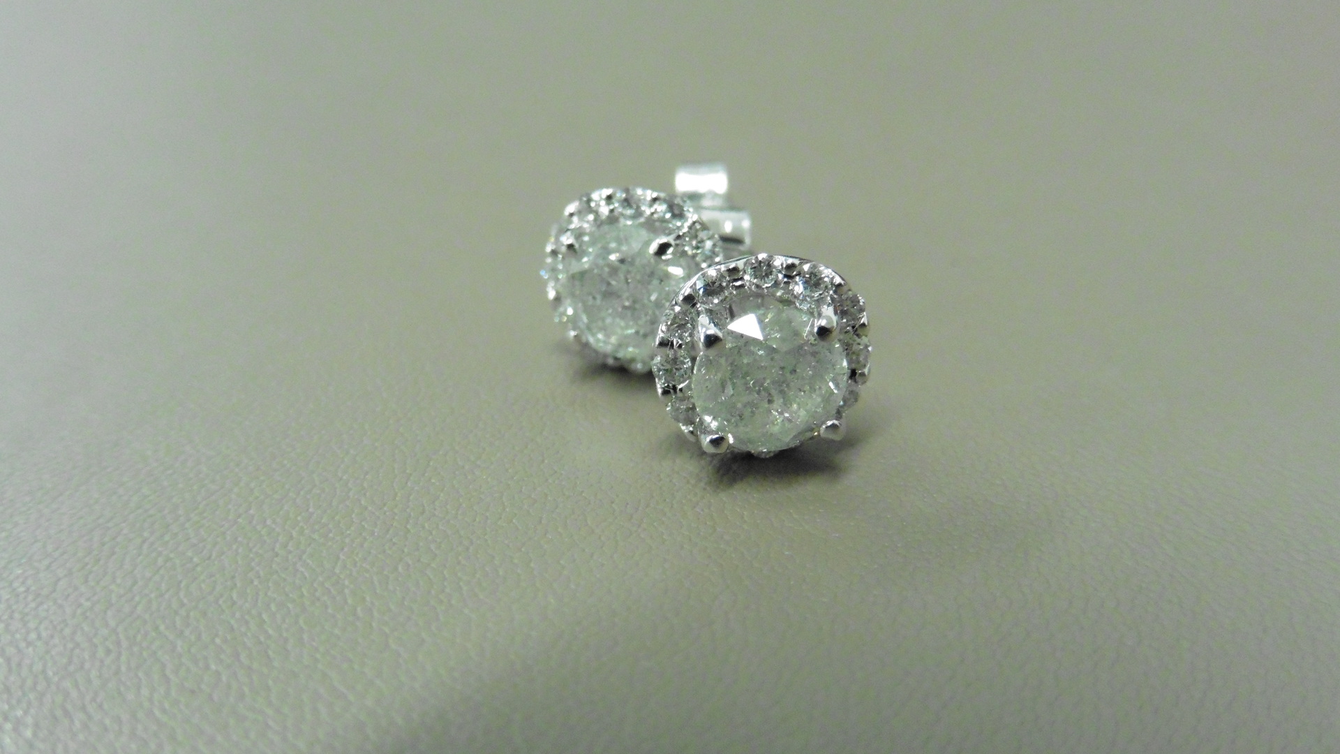 2.00ct Diamond set solitaire style earrings.