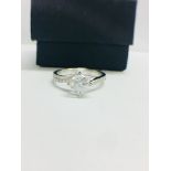 1ct Brilliant cut Diamond set in a diamond set platinum mount