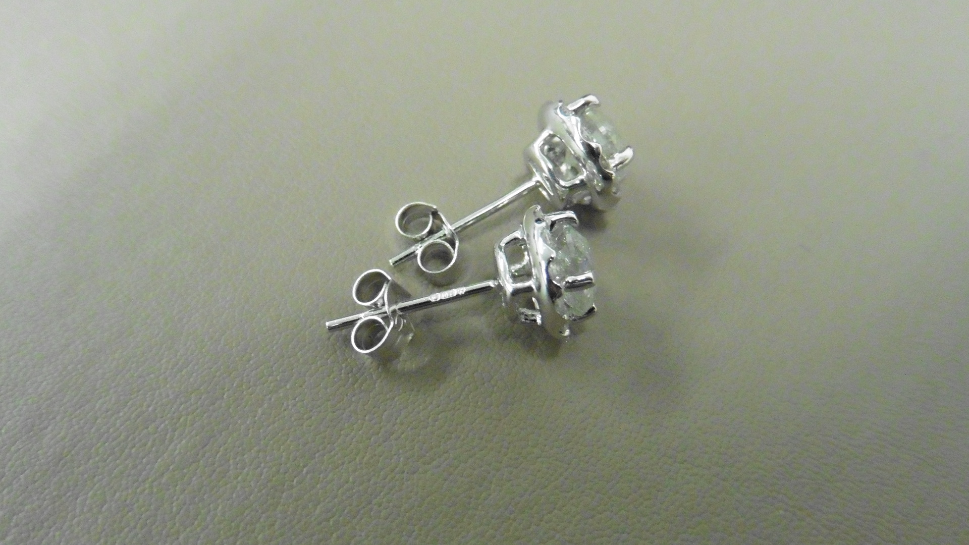 2.00ct Diamond set solitaire style earrings. - Image 2 of 3