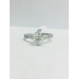 1ct Brilliant cut Diamond set in a diamond set platinum mount