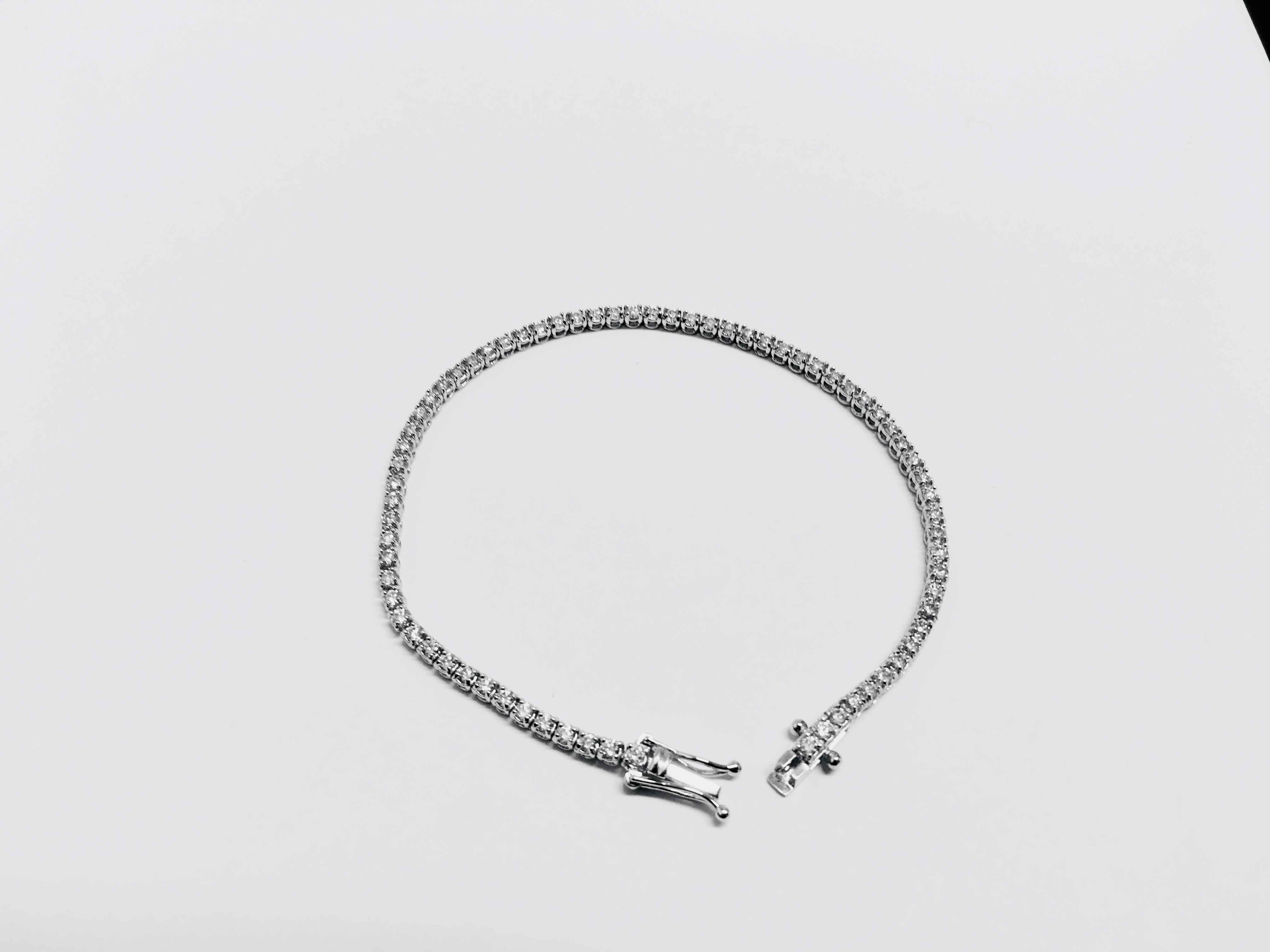 2.10ct diamond tennis bracelet with 70 brilliant cut diamonds - Image 3 of 4