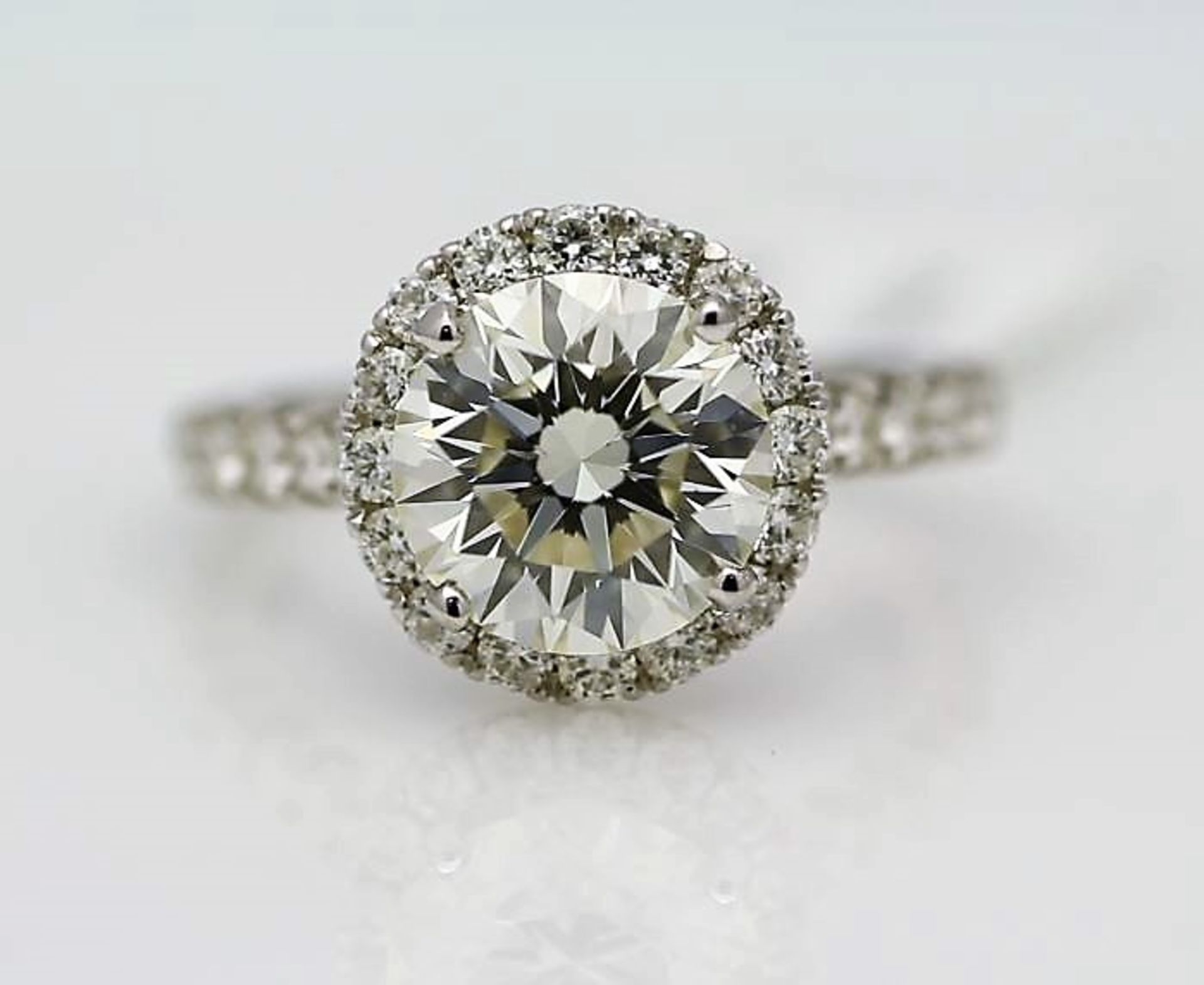 18ct White Gold Single Stone With Halo Setting Ring 3.85