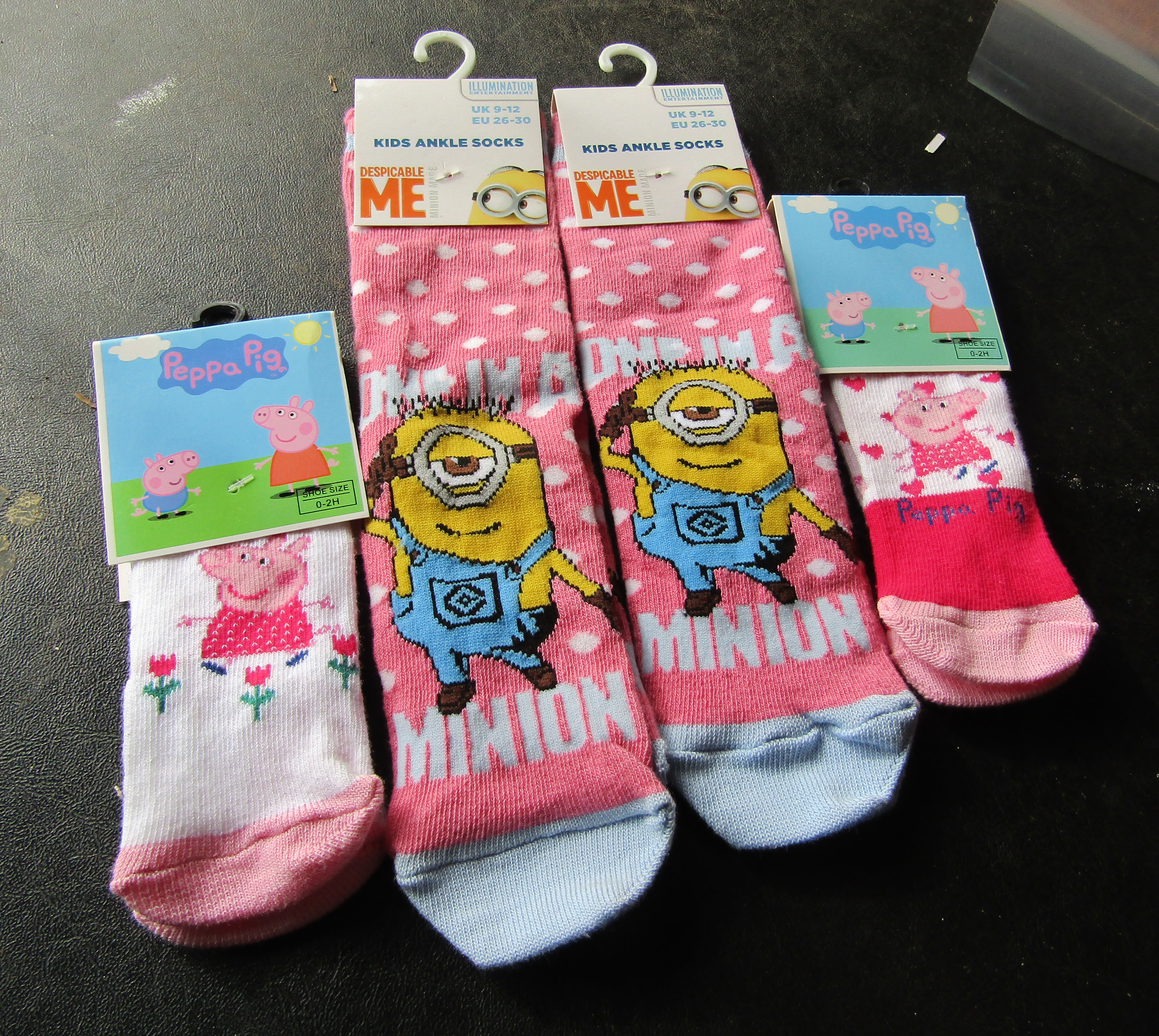 Selection of childrens socks 2x 0-2 size and 2x 9-12 size