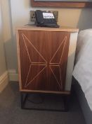 A pair of wood bedside cupboards - matching other items listed. Commercial quality.