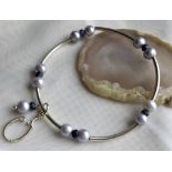 925 stretchy Bracelet with blue pearls and sapphire and sapphire charm horseshoe charm