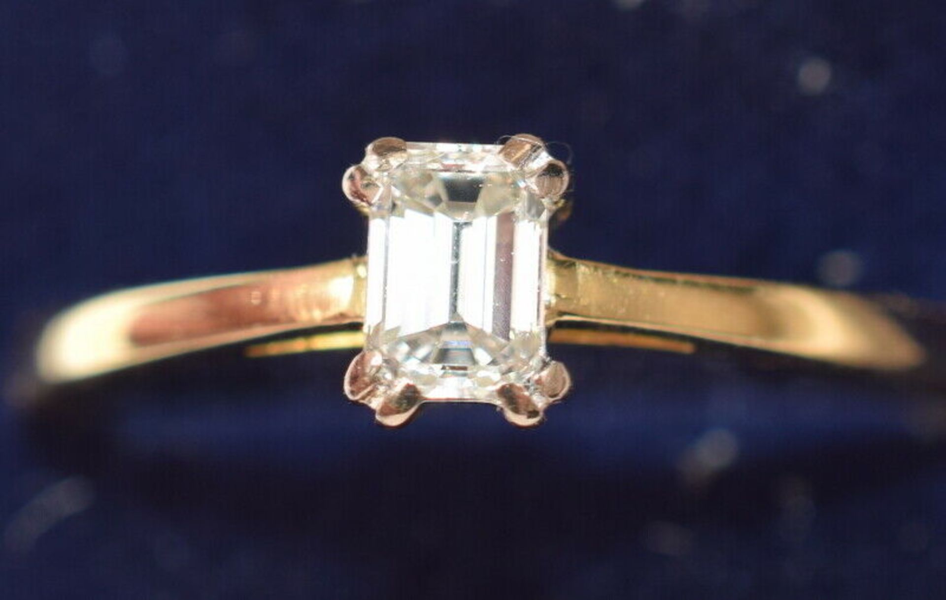 Ladies Diamond Solitaire In Emerald Cut Design 18ct Gold