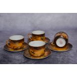 Set of four Japanese cups and saucers