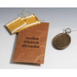 Deutsches Schutzwall-Ehrenzeichen/Westwall-Medaille, Drittes Reich, in Originaltüte, bez."Für Arbeit