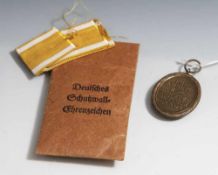 Deutsches Schutzwall-Ehrenzeichen/Westwall-Medaille, Drittes Reich, in Originaltüte, bez."Für Arbeit