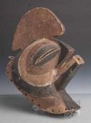 Rituelle Maske (wohl Kongo, Afrika), Vogelkopf, Holz geschnitzt, mit brauner u. schwarzerFarbe