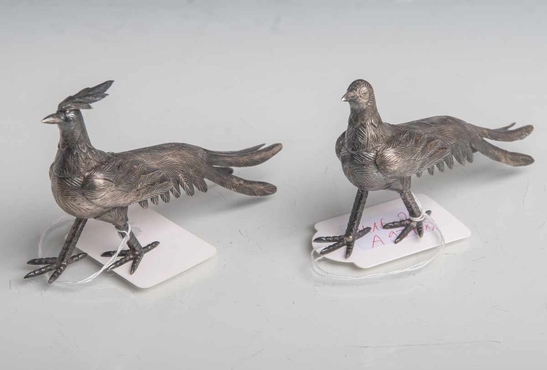 Zwei silberne Paradiesvögel (Silber 925), Gewicht zusammen ca. 70,5 g, L. je ca. 10 cm.