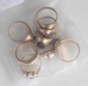 Posten Ringe, Gelbgold 333, 8 Stück, z. T. m. facettiertem Edelsteinbesatz (Amethyst,Granat,