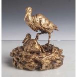 Paillet, Charles (1871-1937), Storchenpaar im Nest, vergoldete Bronze, seitl. sign., H.ca. 14 cm. (
