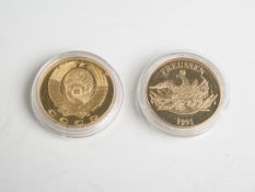 Zwei vergoldete Medaillen, bestehend aus: Preußen, Friedrich der Große, bez. "Heimkehrnach