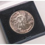 1 Dollar "Liberty" (USA, 1987), Silber 999/1000, sog. Silver Eagle, Dm. ca. 4 cm, Gewichtca. 31,6 g.