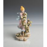 Figurine "Rothaarige junge Dame mit Blumen" (Capodimonte, Italien, 20. Jahrhundert),polychrome