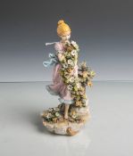Figurine "Rothaarige junge Dame mit Blumen" (Capodimonte, Italien, 20. Jahrhundert),polychrome