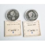 2 Sondermünzen: 1x 1000 Schillings "50 Jahre BRD" (Uganda, 2000) u. 1x 1 Dollar "ElizabethII." (Cook