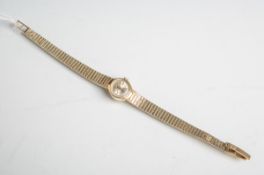 Damenarmbanduhr "E.R.C. Incabloc", Handaufzug, Goldgehäuse u. Armband aus 585er Gold,rundes/ovales