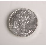 One Dollar "Liberty" (USA, 1988), 999/1000 Silber, Dm. ca. 4 cm, im orig. Etui.Stempelglanz.- - -