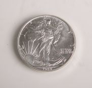 One Dollar "Liberty" (USA, 1988), 999/1000 Silber, Dm. ca. 4 cm, im orig. Etui.Stempelglanz.- - -