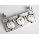 Stoppuhrset (Mitte 20. Jahrhundert), bestehend aus: 1x "Heuer Trackmaster" (Schweiz) u. 2x"Agat"