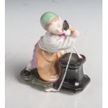 Figurine "Der kleine Schmied" (Höchst, blaue Radmarke), polychrom bemalt, gemarkt FO 149,min.